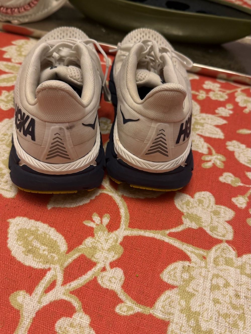 Hoka  women’s  White and Navy Sneakers with Yellow Accent